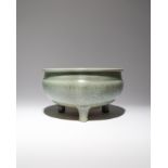 A LARGE CHINESE LONGQUAN CELADON TRIPOD INCENSE BURNER MING DYNASTY The deep rounded sides rising to