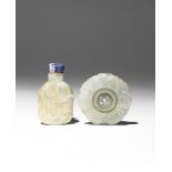 A CHINESE JADEITE SNUFF BOTTLE AND A JADEITE PENDANT LATE QING DYNASTY/REPUBLIC PERIOD The snuff
