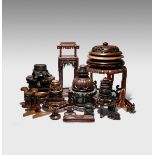 A COLLECTION OF CHINESE WOOD STANDS AND COVERS 19TH AND 20TH CENTURY Variously carved with
