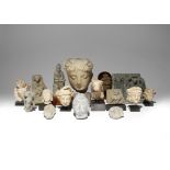 A COLLECTION OF GANDHARAN CARVED SCHIST AND STUCCO FRAGMENTS 2ND-5TH CENTURY AD Variously formed