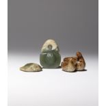 THREE CHINESE JADE CARVINGS QING DYNASTY OR LATER One carved in russet jade with two ducks facing