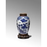 A CHINESE BLUE AND WHITE OVOID VASE KANGXI 1662-1722 Painted with four large panels enclosing