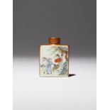 A CHINESE FAMILLE ROSE IRON-RED GROUND SNUFF BOTTLE 19TH CENTURY Of flattened form, painted to one