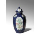 A SAMSON FAMILLE VERTE AND GILT-DECORATED POWDER BLUE-GROUND VASE AND COVER 19TH CENTURY The ovoid