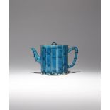 A CHINESE TURQUOISE GLAZED 'BAMBOO' TEAPOT AND COVER KANGXI 1662-1722 The cylindrical body moulded