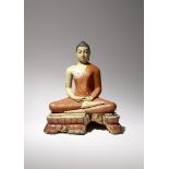 A SRI LANKAN PAINTED SANDALWOOD FIGURE OF BUDDHA MID 18TH CENTURY Carved seated upon a lotus throne,