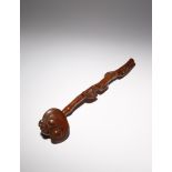 A CHINESE BOXWOOD RUYI SCEPTRE QING DYNASTY The long shaft carved with lingzhi branches twisting
