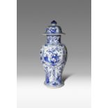 A CHINESE BLUE AND WHITE BALUSTER VASE AND COVER KANGXI 1662-1722 Painted with panels of various