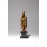 A LARGE CHINESE SOAPSTONE FIGURE OF SHOULAO LATE QING DYNASTY Carved standing holding a ruyi sceptre