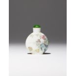 A CHINESE FAMILLE ROSE ENAMELLED GLASS SNUFF BOTTLE FOUR CHARACTER QIANLONG MARK AND PROBABLY OF THE