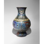 A LARGE CHINESE CLOISONNE 'DRAGON' HU-SHAPED VASE 19TH CENTURY Decorated with dragons chasing
