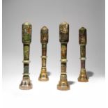 FOUR INDIAN MARBLE CHARPOY LEGS 19TH CENTURY Painted with nobles, ladies, soldiers and other figures