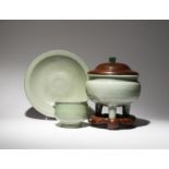 TWO CHINESE LONGQUAN CELADON INCENSE BURNERS AND A DISH MING DYNASTY The larger incense burner