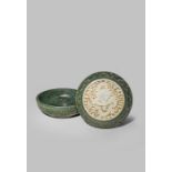A CHINESE SPINACH-GREEN AND WHITE JADE CIRCULAR 'DRAGON' BOX AND COVER QING DYNASTY OR LATER The