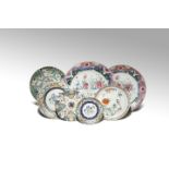 SEVEN CHINESE ENAMELLED PORCELAIN PLATES 18TH CENTURY Comprising: two large famille rose plates