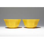 A PAIR OF CHINESE BEIJING YELLOW GLASS OCTAGONAL-SECTION BOWLS LATE QING DYNASTY Each raised on a