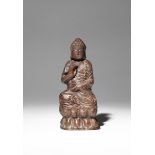 A CHINESE BUFFALO HORN FIGURE OF BUDDHA PROBABLY LATE QING DYNASTY Carved seated in dhyanasana