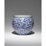A CHINESE BLUE AND WHITE 'PHOENIX' JARDINIERE 20TH CENTURY Painted with four stylised phoenix in