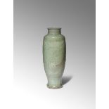 A CHINESE LONGQUAN CELADON VASE MING DYNASTY The tall ovoid body supported on a gently spreading