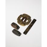 A SMALL COLLECTION OF JAPANESE SWORD MOUNTINGS MEIJI PERIOD, 19TH AND 20TH CENTURY Comprising: a