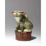 A JAPANESE KAKIEMON STYLE MODEL OF A TIGER MEIJI PERIOD, C.1900 After a Japanese 17th century model,