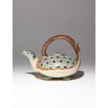 AN UNUSUAL JAPANESE TEA KETTLE AND COVER MEIJI PERIOD, 1868-1912 Modelled as a minogame, the
