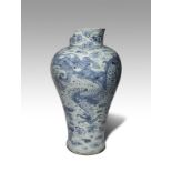 A LARGE KOREAN BLUE AND WHITE DRAGON VASE JOSEON DYNASTY, 19TH CENTURY The tall baluster-shaped body