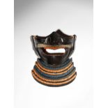A JAPANESE LACQUER HALF MASK, MENPO EDO PERIOD, 18TH OR 19TH CENTURY In black lacquer on an iron