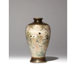 A JAPANESE SATSUMA VASE MEIJI PERIOD, 19TH CENTURY The tall baluster-shaped body decorated with