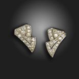 A pair of Art Deco French diamond double clip earrings, the pierced stylised ribbons millegrain-