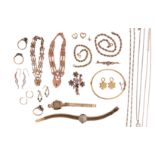 Various items of gold jewellery, including a bangle, two bracelets, a wristwatch, chains, earrings