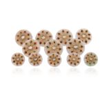 A set of twelve Indian gem-set jade buttons, each button applied with a gold foliate motif set