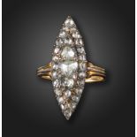 A navette-shaped diamond cluster ring, set overall with graduated rose-cut diamonds in silver on