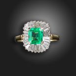 An emerald and diamond ballerina ring, the emerald-cut emerald weighs approximately 1.90cts, set