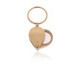 An 18ct gold jewellery loupe, London marks for 1987, with a gold suspension loop, loupe 2.7cm