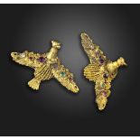 A pair of Regency gold acrostic dove brooches, each set with a ruby, emerald, garnet, amethyst, ruby