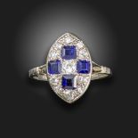 A sapphire and diamond lozenge ring, set with graduated old circular-cut diamonds and square-