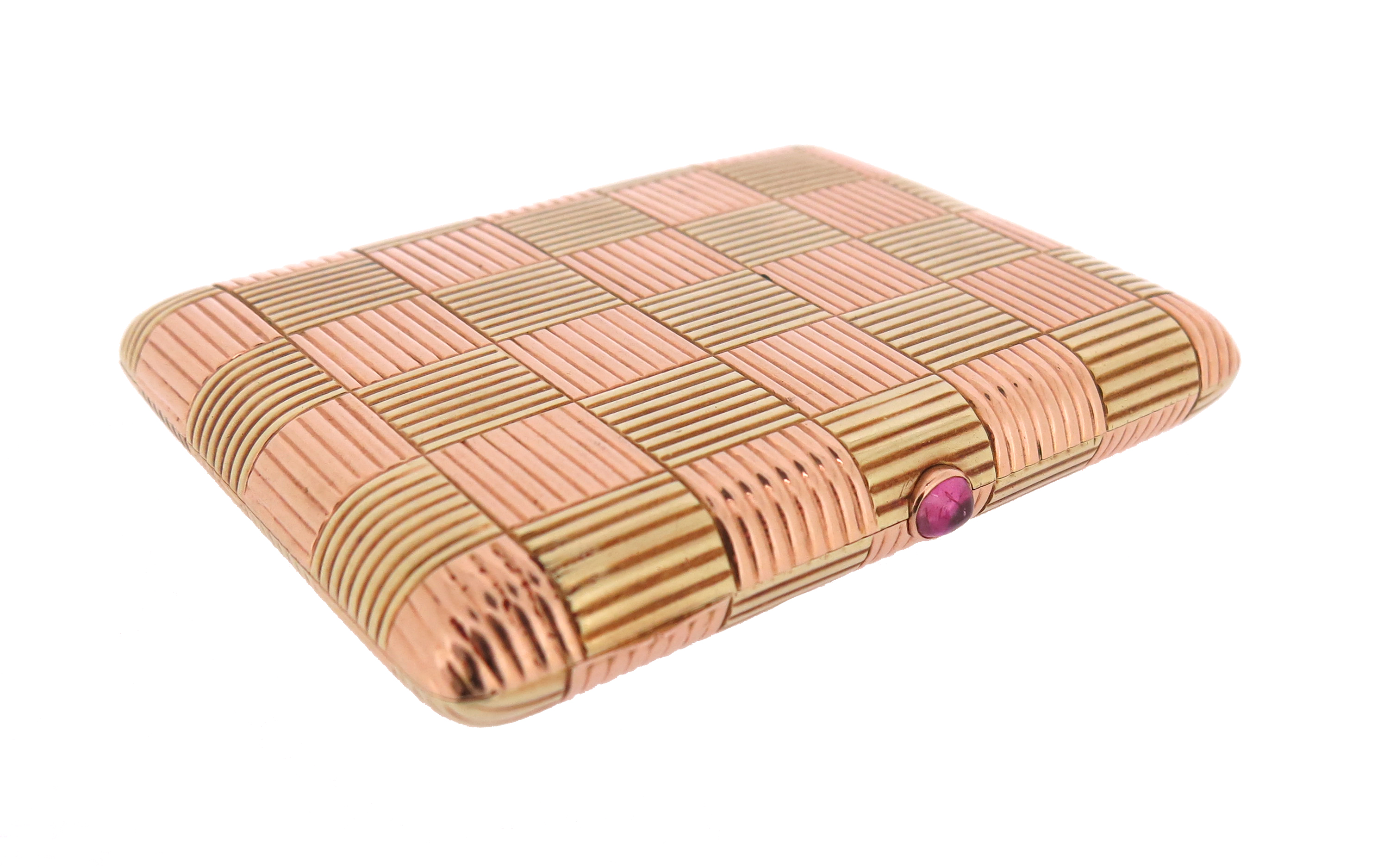 A two-colour gold cigarette case, the hinged rectangular case with fluted chequerboard pattern in
