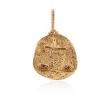 A gold medallion zodiac pendant, the asymmetrical oval medallion depicting the Scales of Justice and