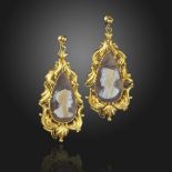 A pair of Victorian cameo-mounted gold earrings, the drop-shaped sardonyx cameos each depicting a