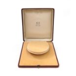 A leather fitted tiara case by Chaumet, the brown leather box with cream velvet interior and silk