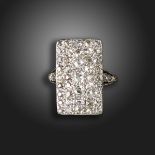 An Art Deco diamond rectangular plaque ring, set with graduated old circular-cut diamonds, with