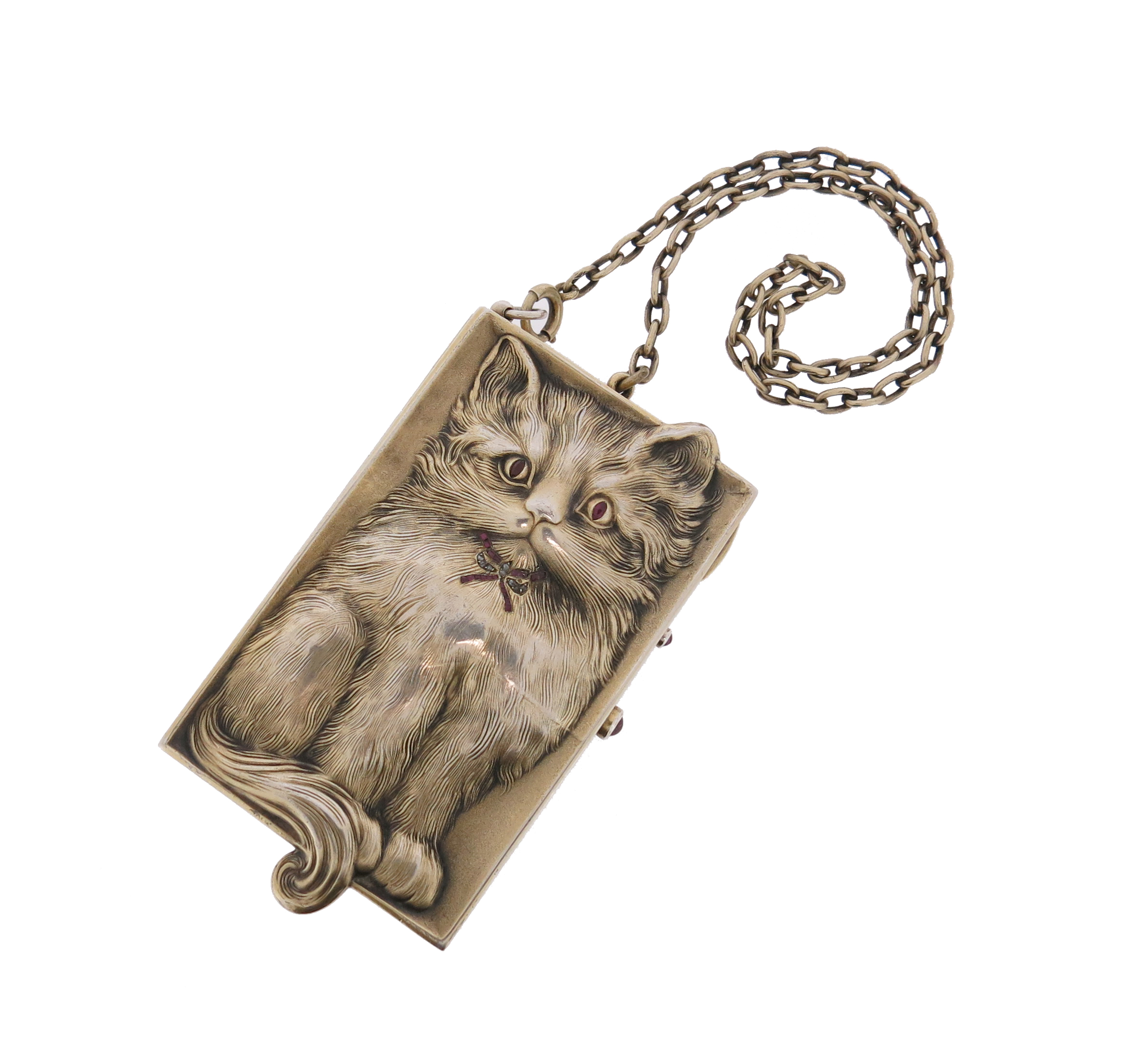 An early 20th century cat-form silver gilt minaudiθre, the rectangular box realistically chased with