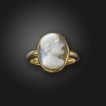 A 19th century sardonyx cameo ring, depicting a saint and set in gold, cameo 1.5cm high, ring size