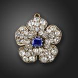 A Victorian sapphire and diamond flowerhead brooch pendant, centred with a cushion-shaped