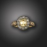 A George III fancy diamond cluster ring, centred with a fancy-coloured old cushion-shaped diamond