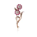 A ruby and diamond-set convertible gold brooch, the flowerheads set with cushion-shaped rubies and