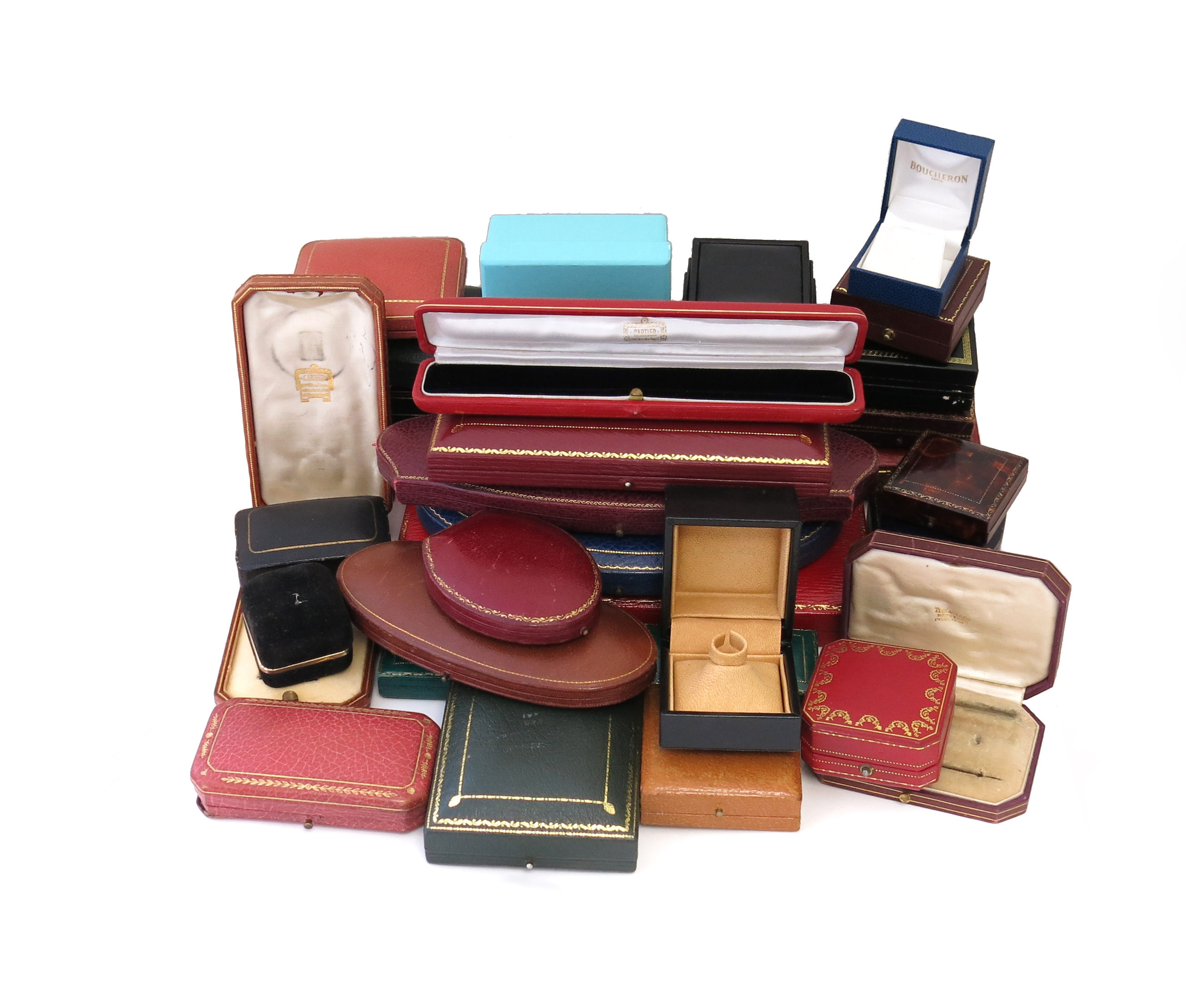 A collection of thirty jewellery boxes, including boxes by Cartier, Carrington, Harvey & Gore,