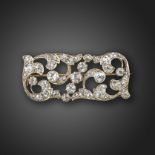 A Victorian composite diamond plaque brooch, set with graduated old circular-cut diamonds to the