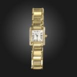 A Tank Francais diamond-set gold wristwatch by Cartier, the signed rectangular dial with black Roman